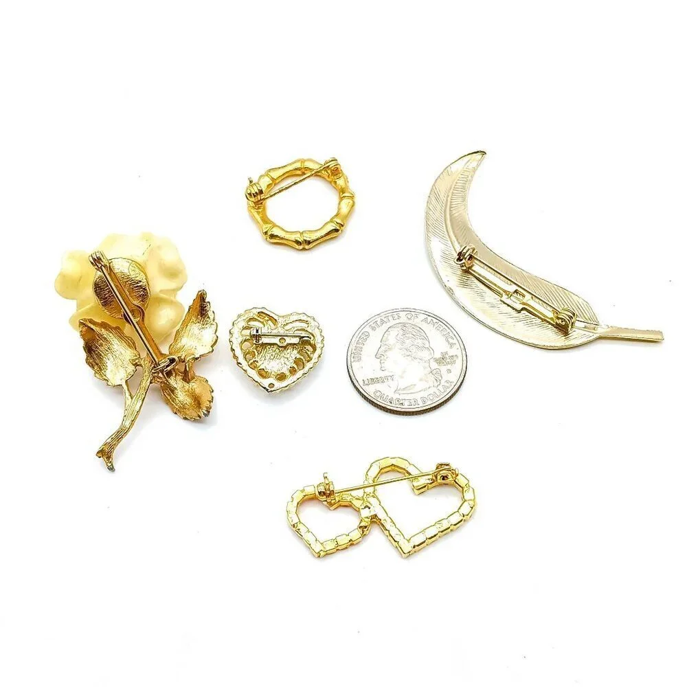 Elegant Gold and Silver Brooch Set
